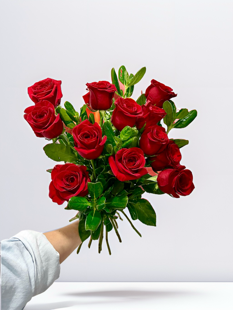 Image: Breathtaking bouquet of two dozen vibrant red roses from Bloom & Petals flower shop